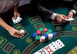 Live baccarat dealer at harta138 slot multi-camera studio with card placement